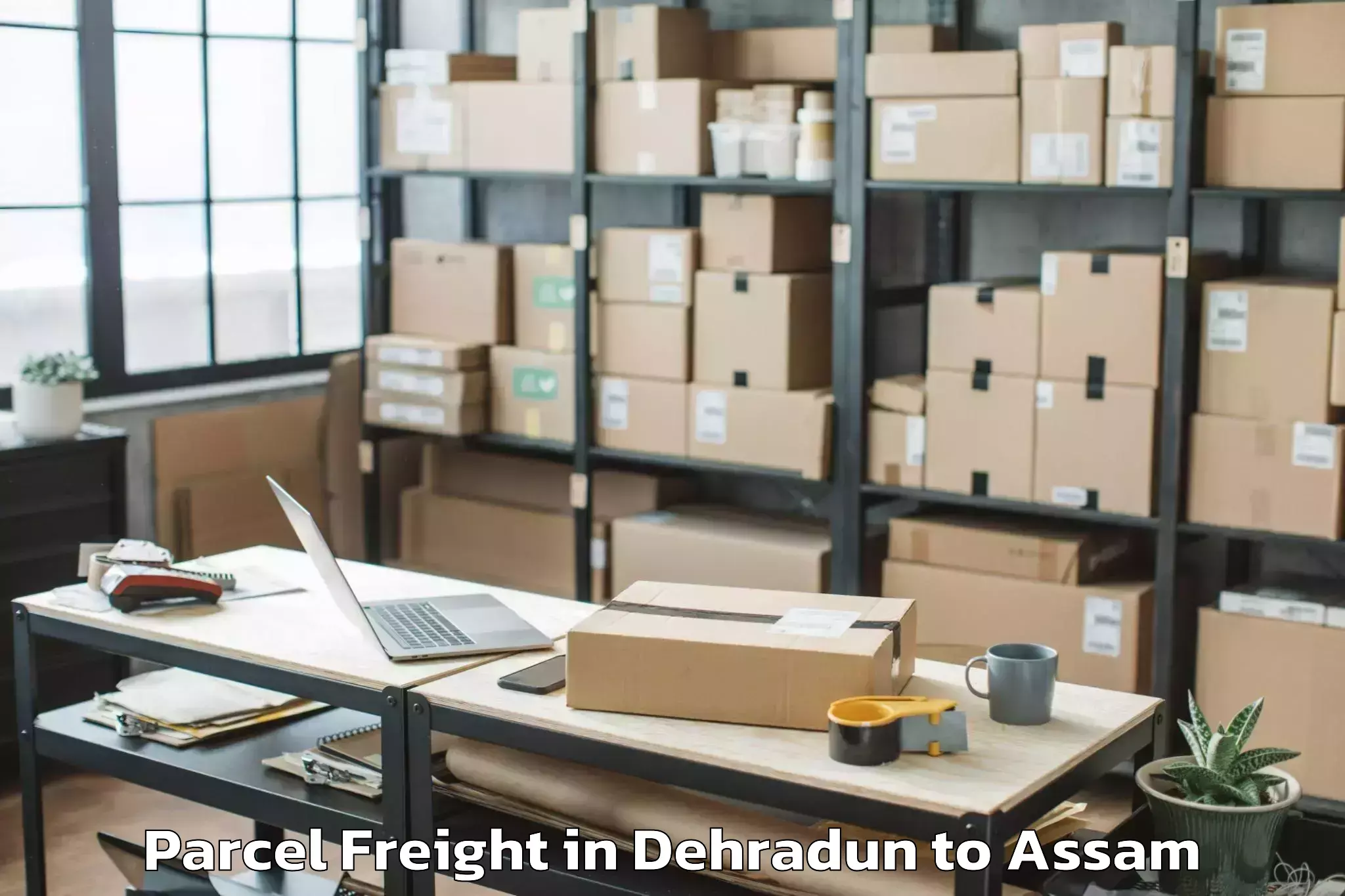 Discover Dehradun to Haflong Parcel Freight